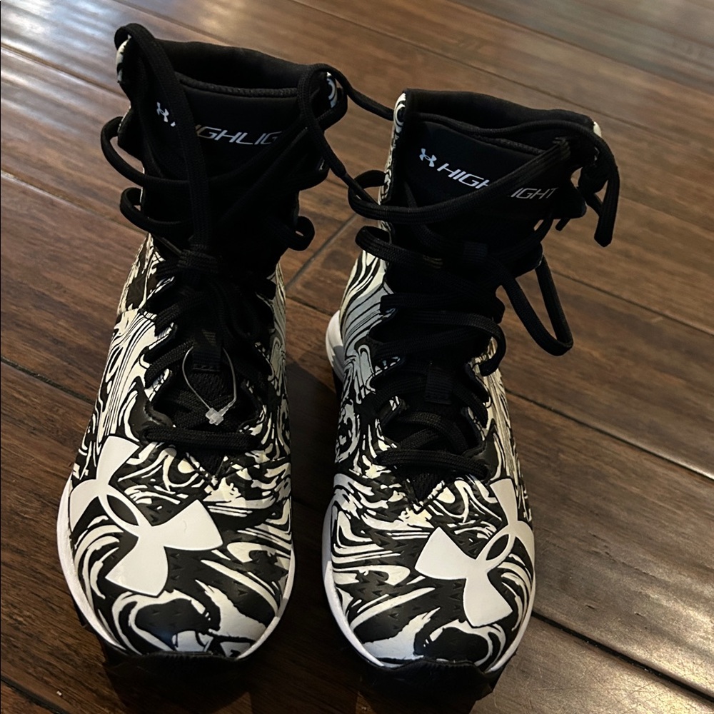 Under Armour Black and White Swirl High-Tops
New without tag